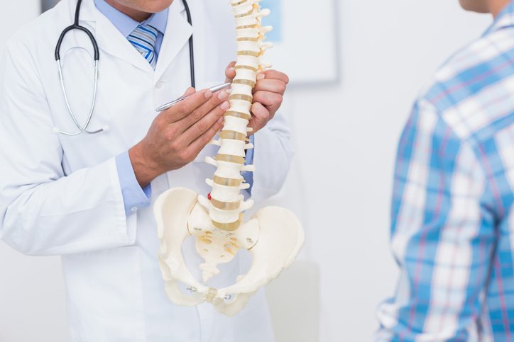 What are the conditions treated by the best spine surgeon in India?